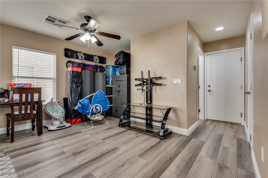 10519 Mann Street Las Vegas, NV 89141 - Photo 8 of 48 Downstairs den with entrance from garage