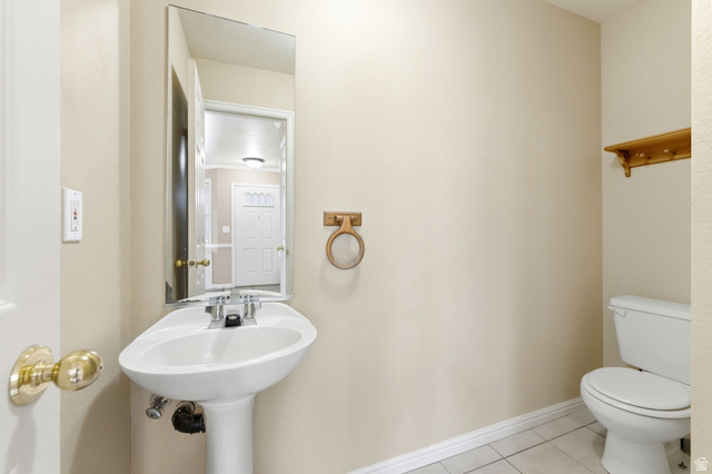 1052 South 950 East, Unit 33 Provo, UT 84606 - Photo 6 of 12 Bathroom with toilet and light tile patterned flooring