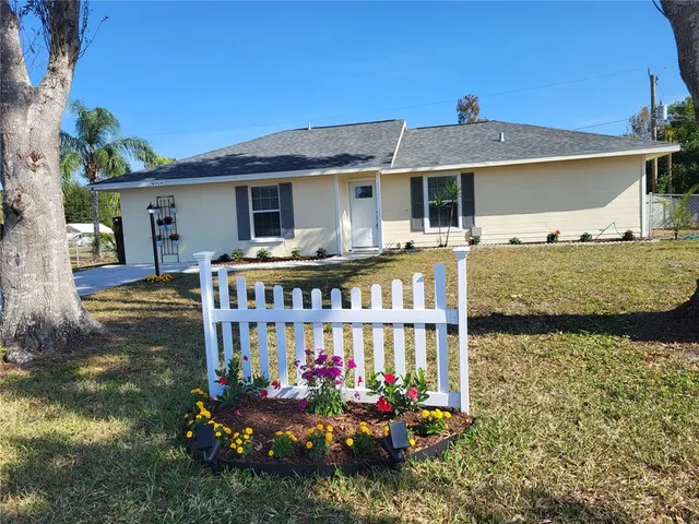a front view of house with outdoor space