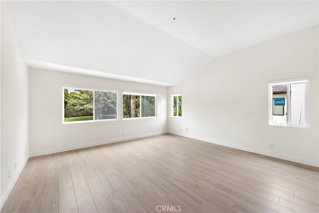 8 Via Jazmin San Clemente, CA 92672 - Photo 15 of 25 an empty room with wooden floor and windows