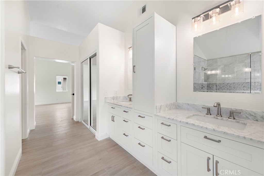 8 Via Jazmin San Clemente, CA 92672 - Photo 16 of 25 a bathroom with a sink and a mirror
