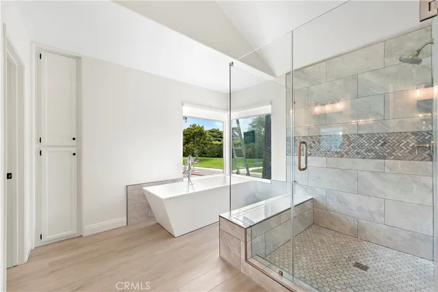 a swimming pool with outdoor seating