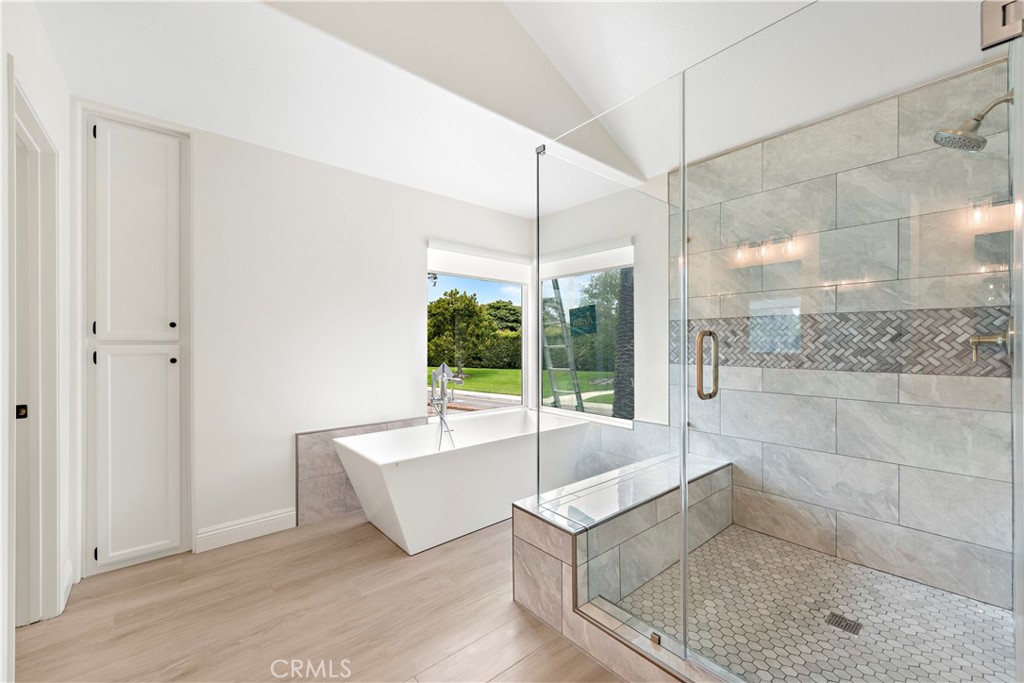 8 Via Jazmin San Clemente, CA 92672 - Photo 17 of 25 a bathroom with a tub and shower