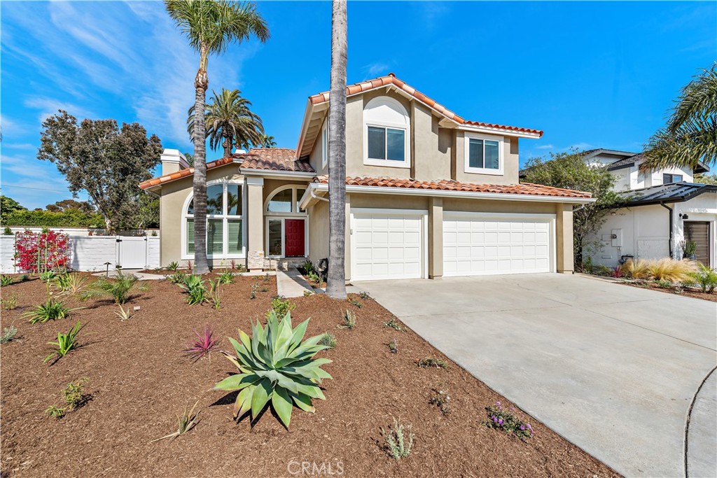 8 Via Jazmin San Clemente, CA 92672 - Photo 25 of 25 a front view of a house with a yard and garage