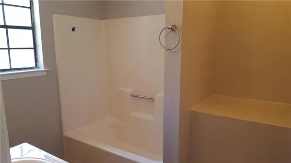 a bathroom with a bathtub