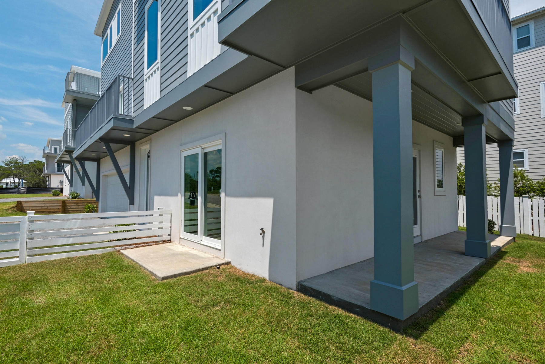 29 Seaview Dr Inlet Beach, Unit LOT 7 Inlet Beach, FL 32461 - Photo 6 of 45 a view of house with a porch and a yard