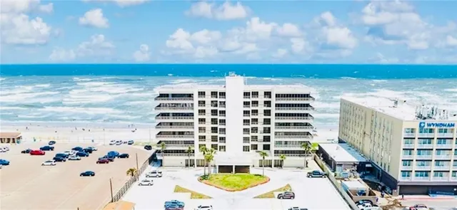 swimming pool view with an outdoor seating