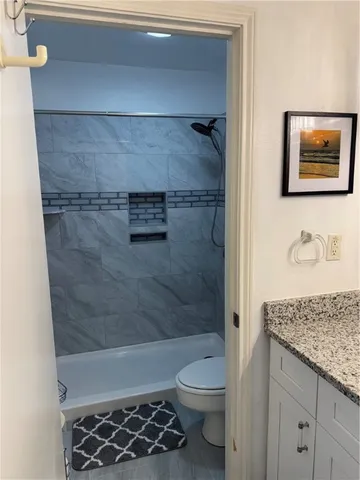 a view of a livingroom with furniture and a couch