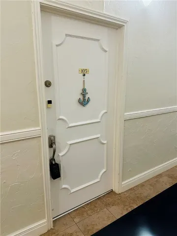 a view of a room with windows