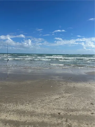 a view of beach and ocean