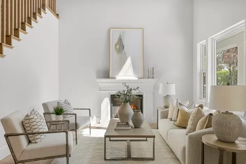 a view of a dining room with furniture window and outside view