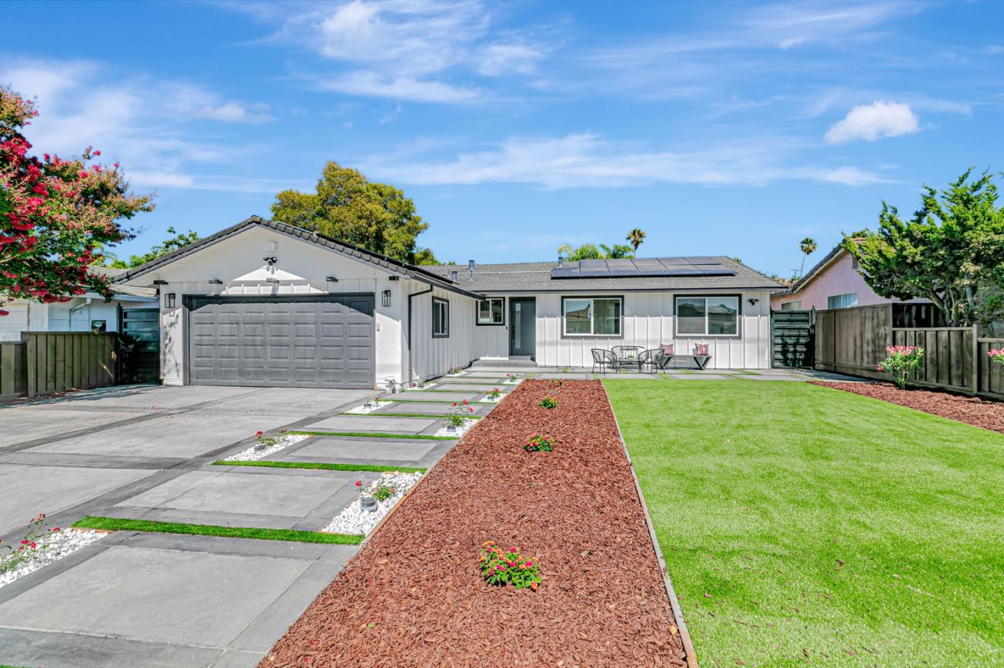 3826 Carryduff Way San Jose, CA 95121 - Photo 1 of 1 a front view of a house with a yard