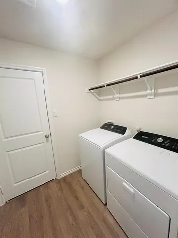 a utility room with dryer and washer