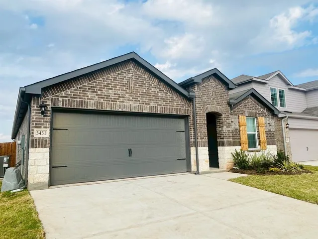 a view of an house with garage