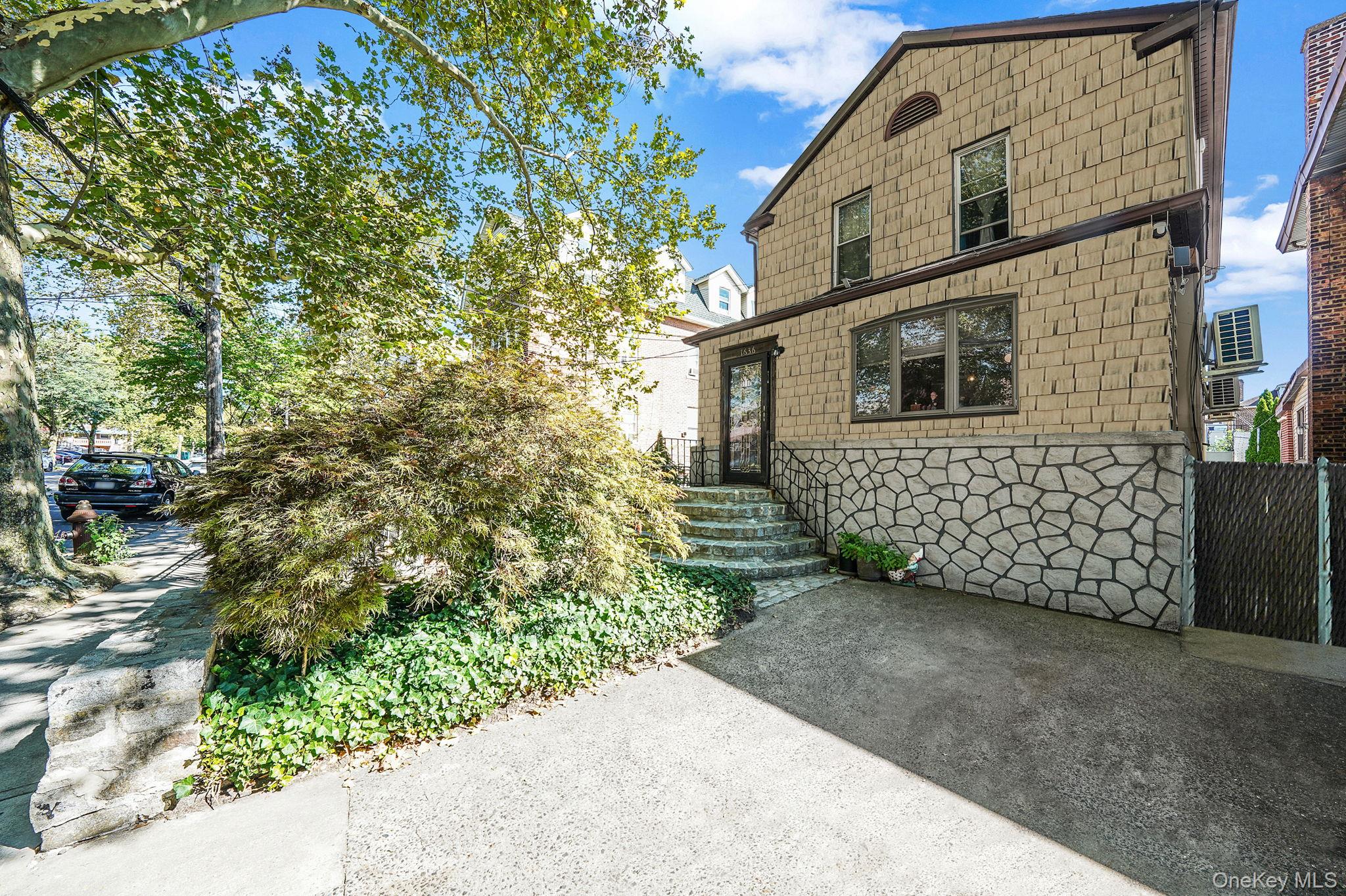 View of front of home with stone siding
