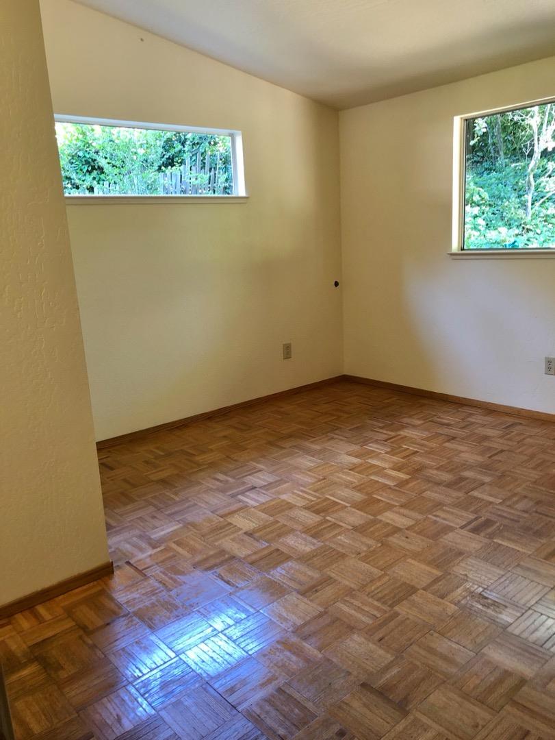 187 Chapman Road Woodside, CA 94062 - Photo 14 of 29 an empty room with a window