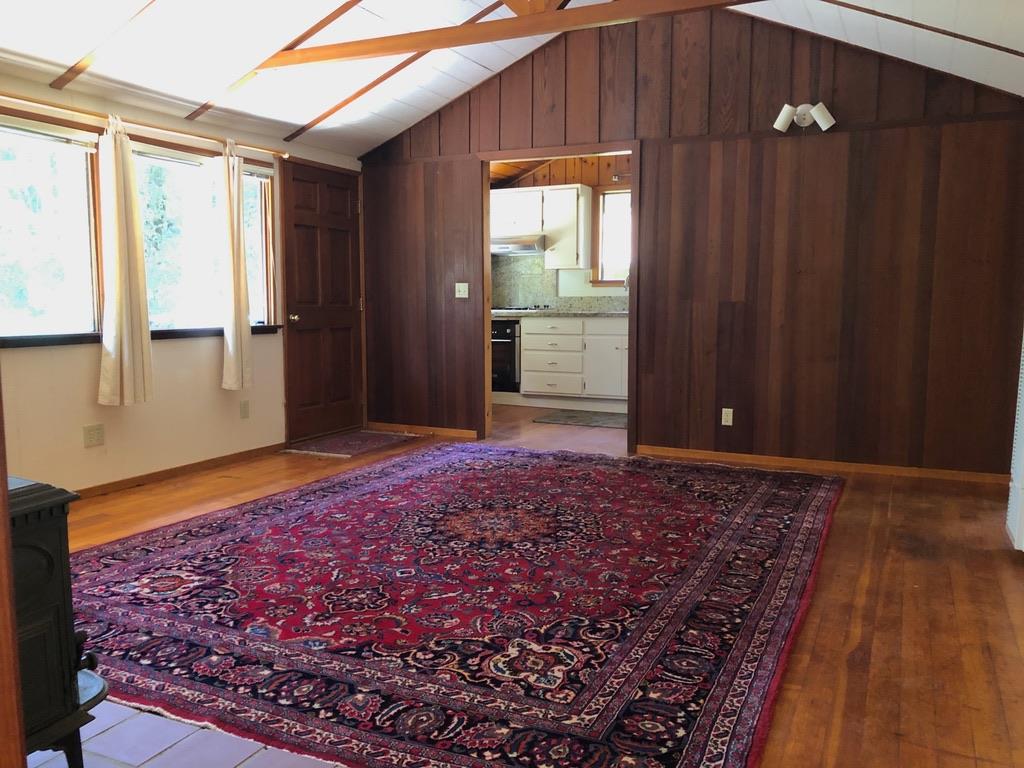 187 Chapman Road Woodside, CA 94062 - Photo 8 of 29 a view of an empty room and window