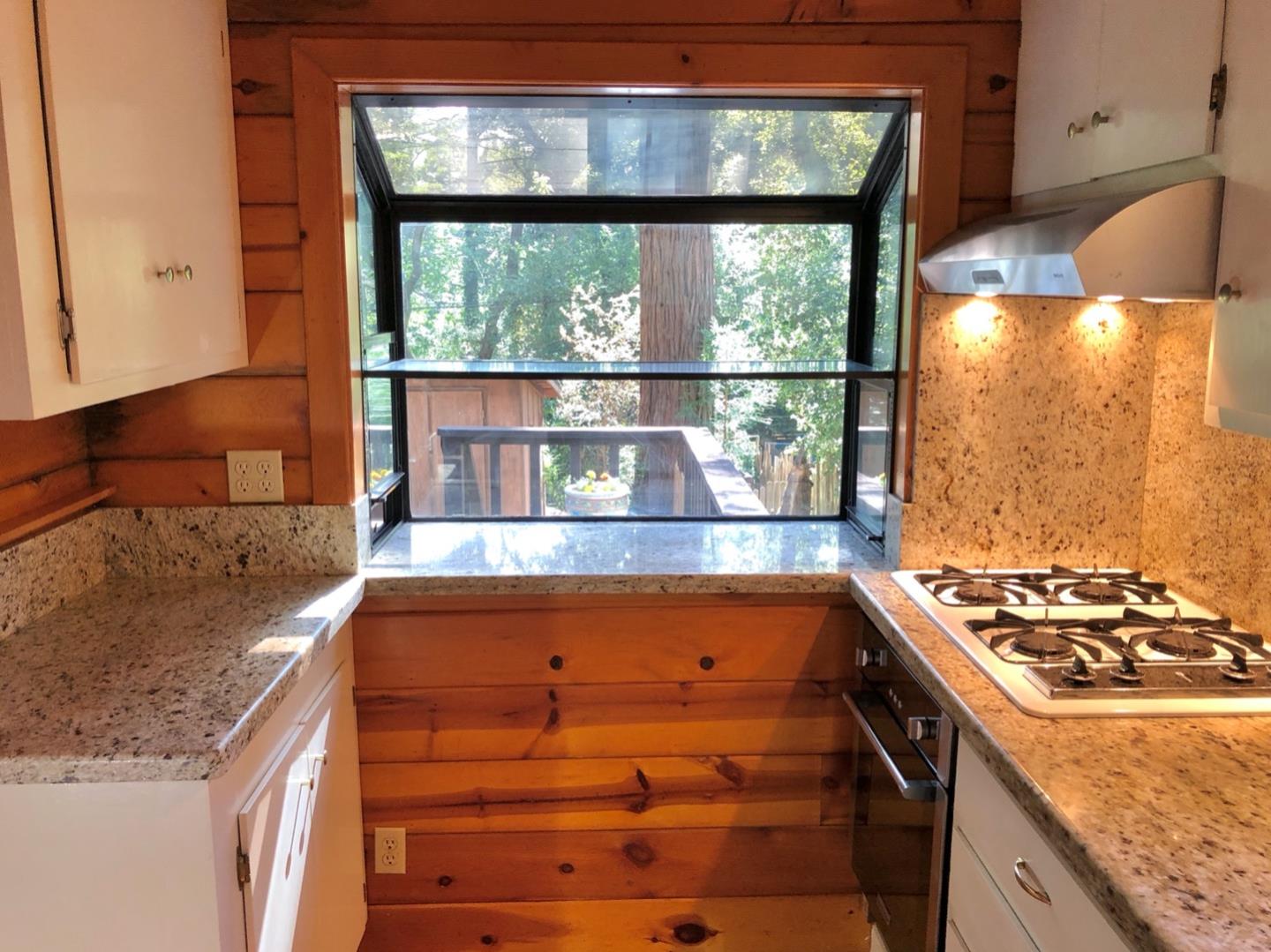 187 Chapman Road Woodside, CA 94062 - Photo 10 of 29 a kitchen with a stove and a sink