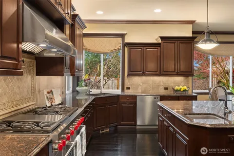 a spacious bedroom with a bed and a large window