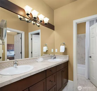 a view of a patio with table and chairs and potted plants