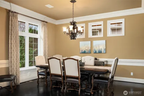 a living room with furniture fireplace and flat screen tv