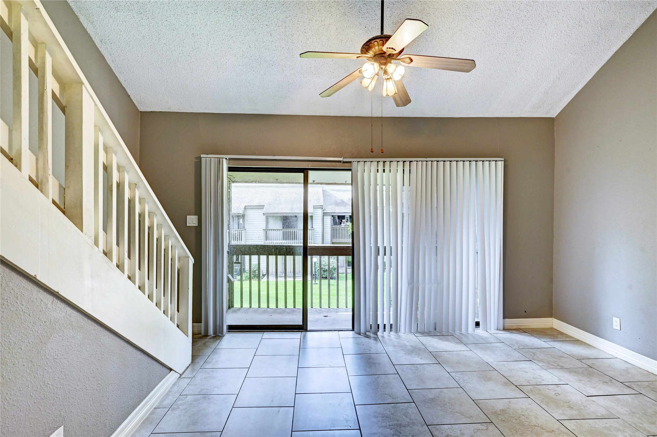 12900 Walden Road, Unit 6 Montgomery, TX 77356 - Photo 17 of 39 Living room/dining combo with a light and airy feel.