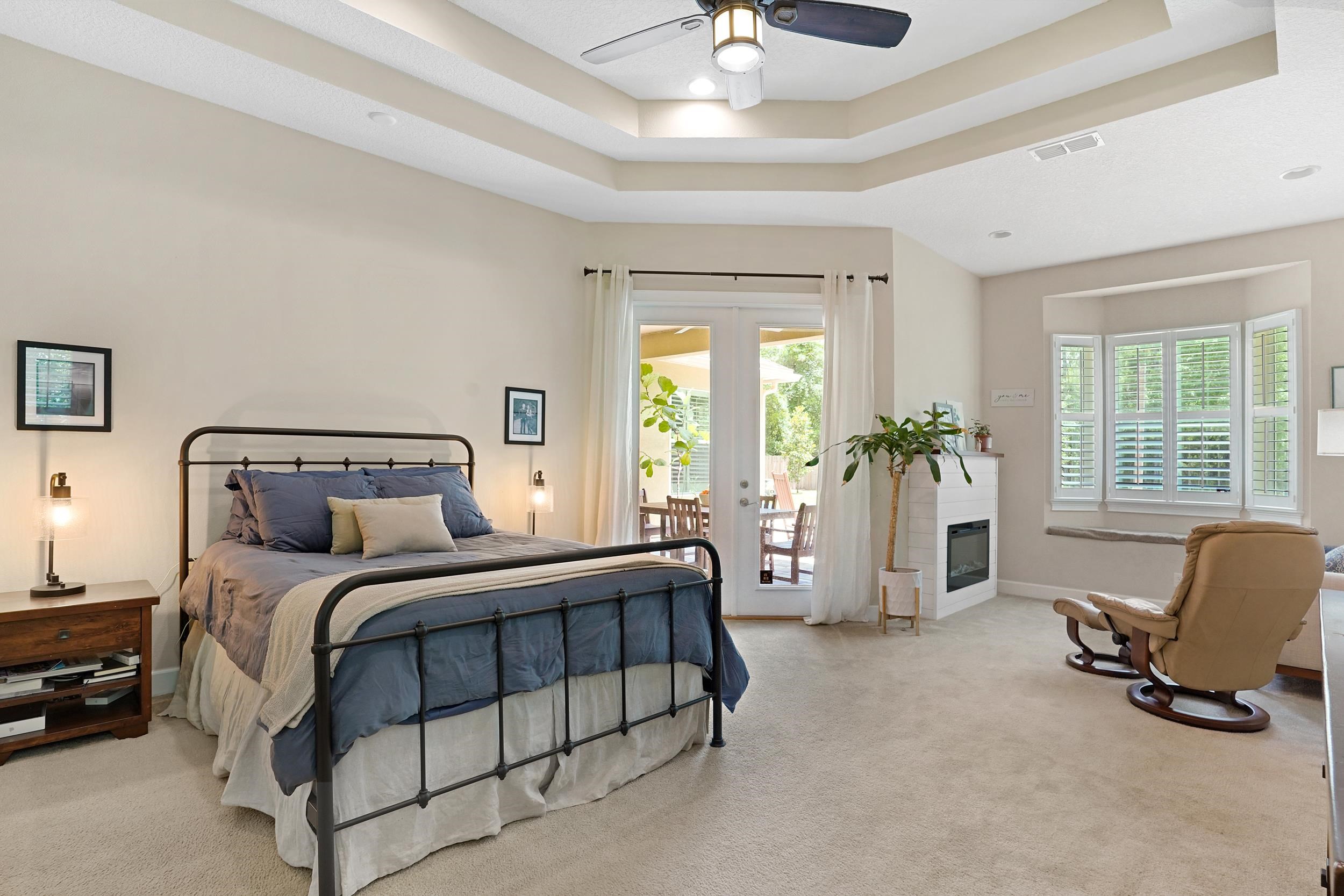 1308 Acorn Ridge Court St. Augustine, FL 32092 - Photo 18 of 47 a bedroom with a bed chair and window