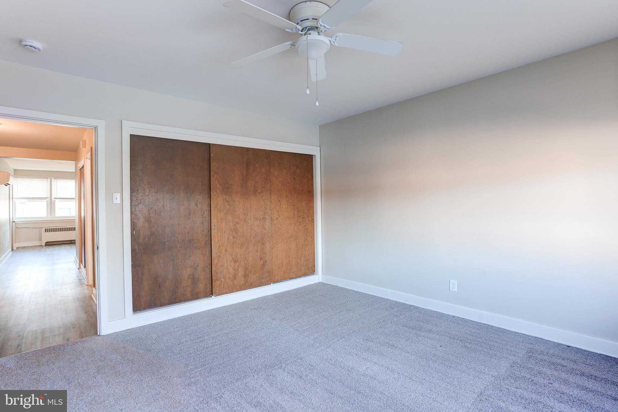 310 Bridge Street, Unit A New Cumberland, PA 17070 - Photo 6 of 7 an empty room with fan and entrance