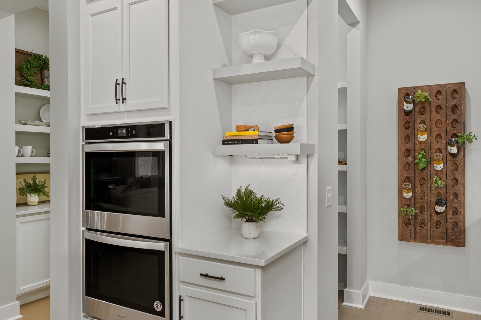 4821 Kedron Road Spring Hill, TN 37174 - Photo 18 of 71 a kitchen with white cabinets and white appliances
