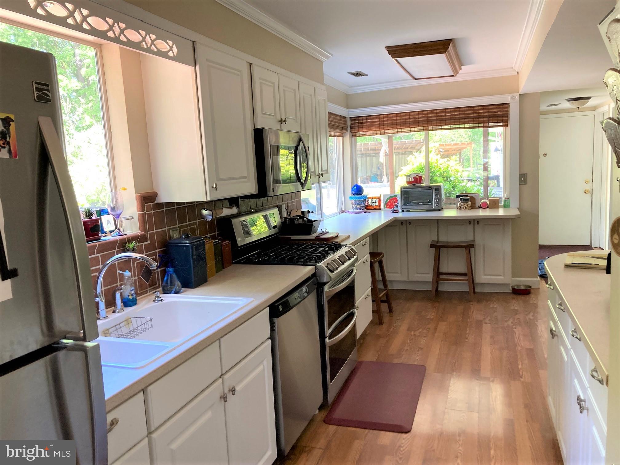 6125 Sandy Point Road Prince Frederick, MD 20678 - Photo 11 of 56 The 20x10 upgraded galley Kitchen accessed off DR