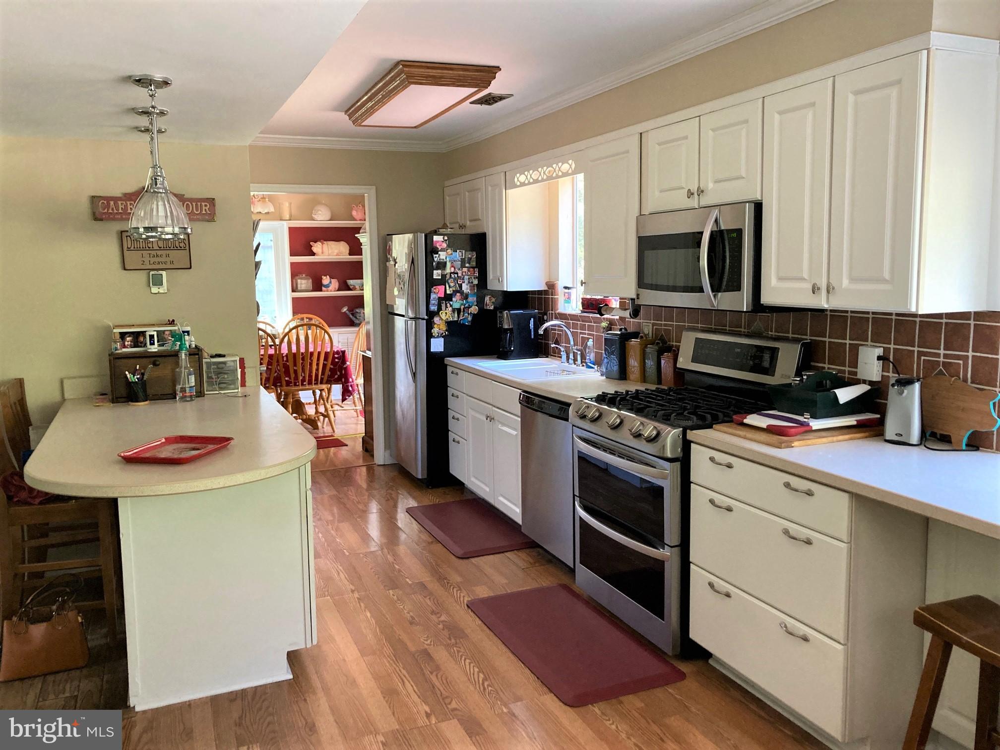 6125 Sandy Point Road Prince Frederick, MD 20678 - Photo 13 of 56 View of the Kitchen from the Garage entry