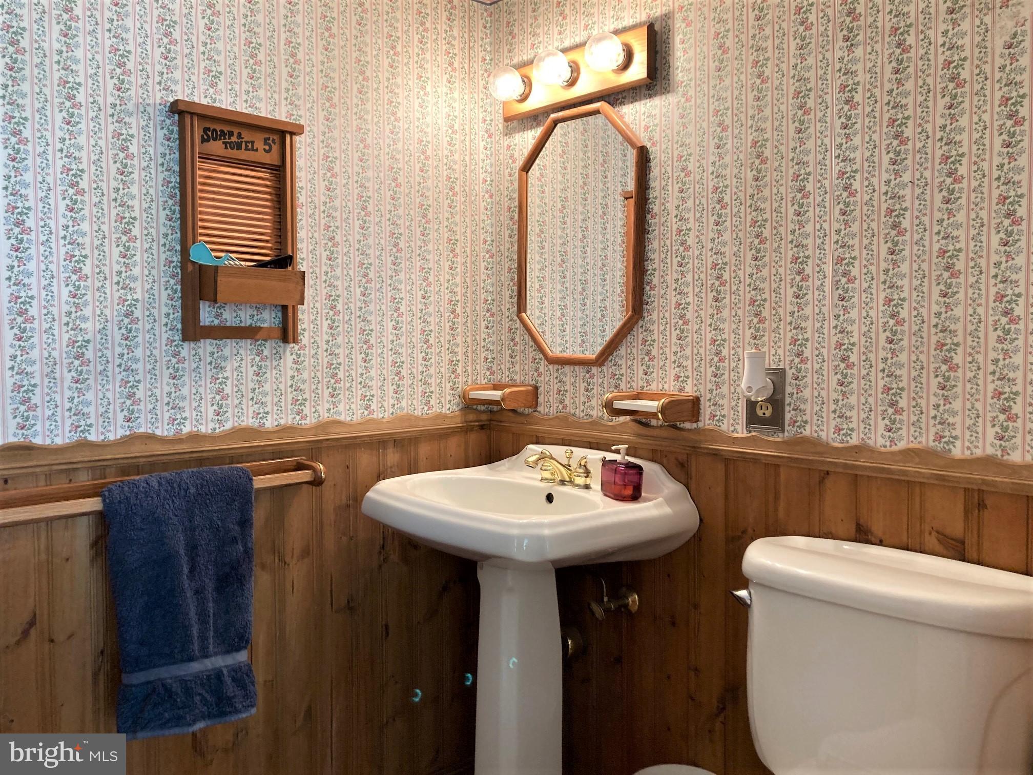 6125 Sandy Point Road Prince Frederick, MD 20678 - Photo 15 of 56 Spacious Half Bath is located of Kit hallway