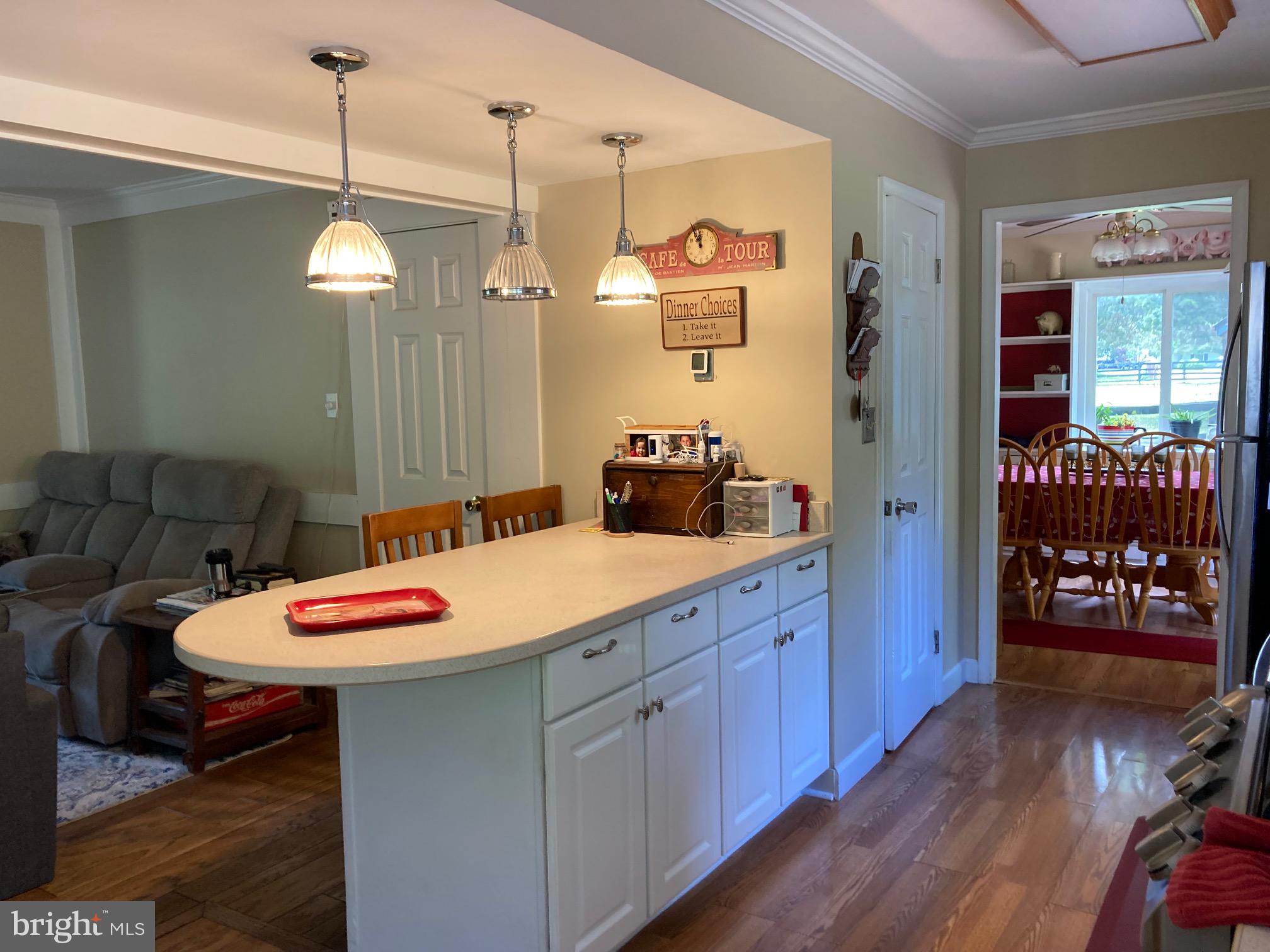 6125 Sandy Point Road Prince Frederick, MD 20678 - Photo 16 of 56 Kitchen island offers more counter & storage space