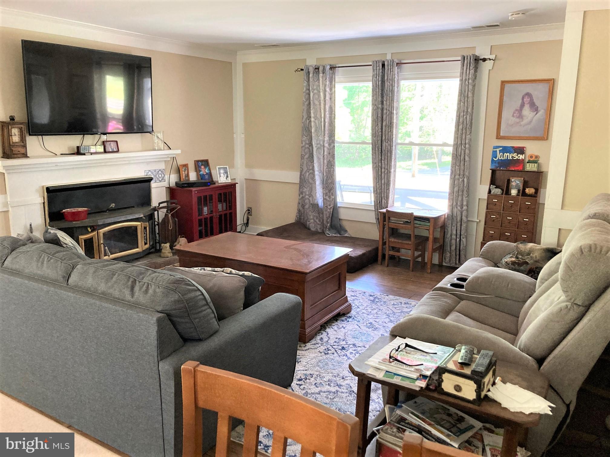 6125 Sandy Point Road Prince Frederick, MD 20678 - Photo 18 of 56 Enjoy warm fires & good talks in the generous FRm