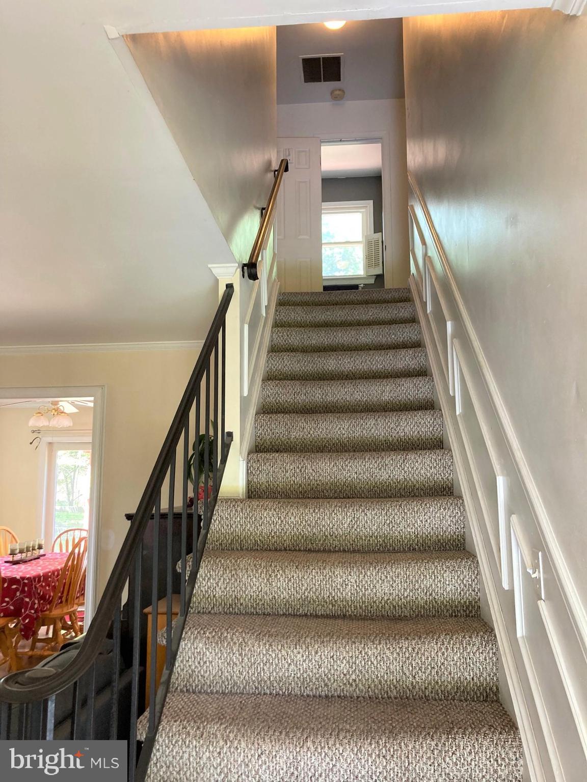 6125 Sandy Point Road Prince Frederick, MD 20678 - Photo 19 of 56 Take the center stairs to upper level living space