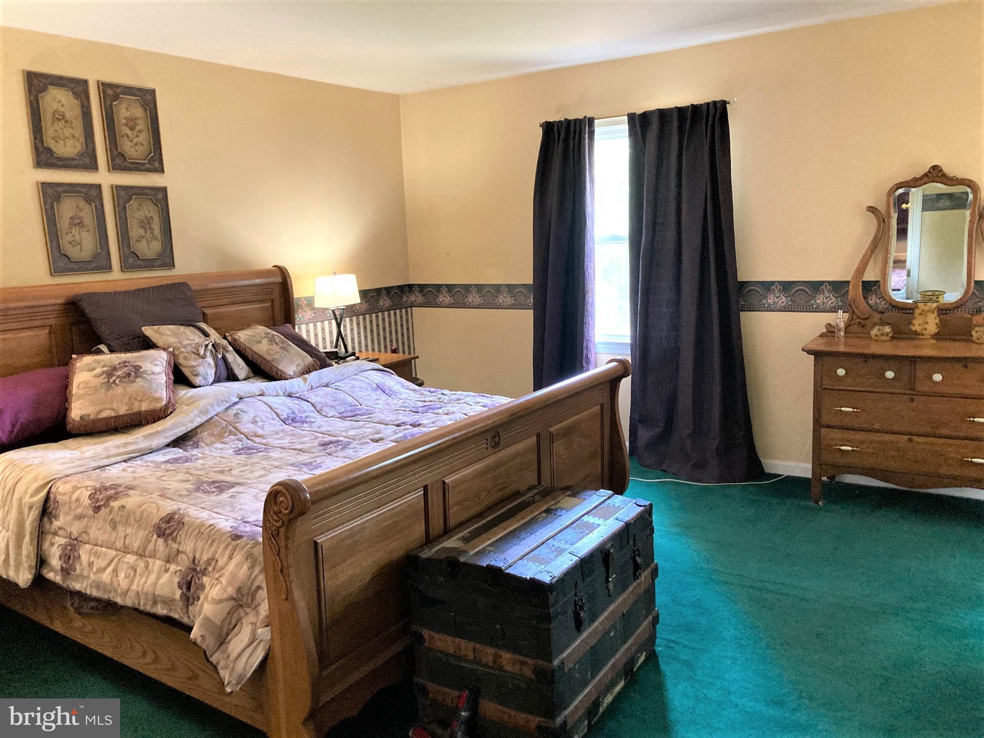 6125 Sandy Point Road Prince Frederick, MD 20678 - Photo 20 of 56 18x16 carpeted Master Suite overlooks the front yd