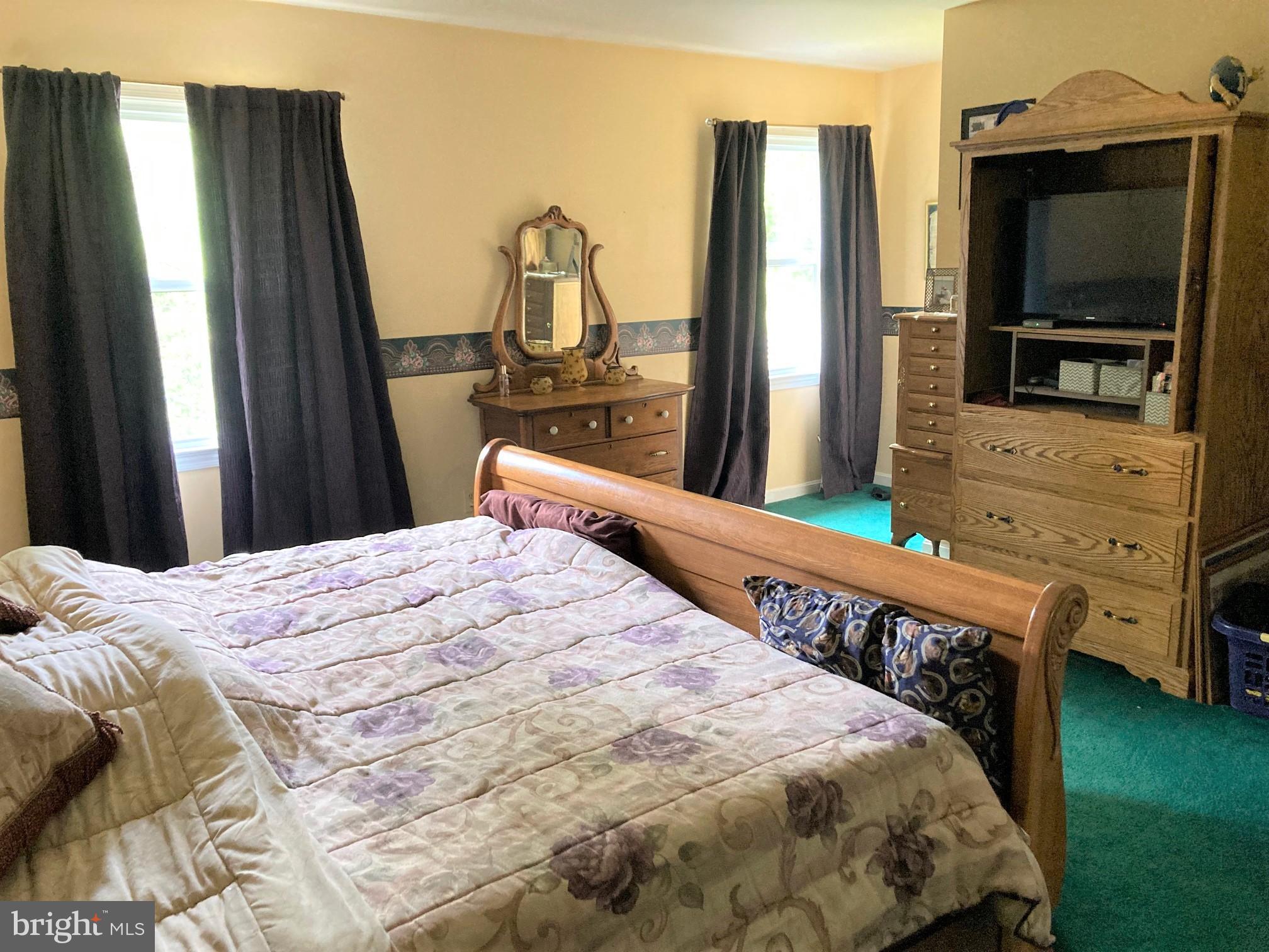 6125 Sandy Point Road Prince Frederick, MD 20678 - Photo 23 of 56 A king bed fits easily in this MBR space