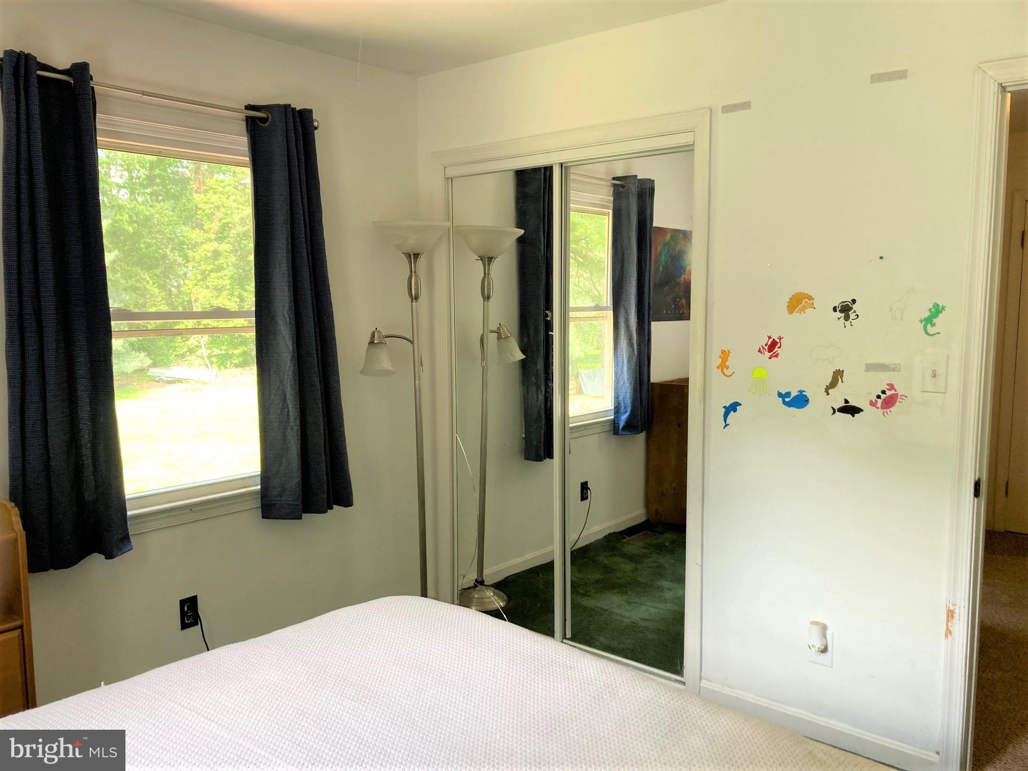 6125 Sandy Point Road Prince Frederick, MD 20678 - Photo 33 of 56 BR3 mirrored door and double closet view