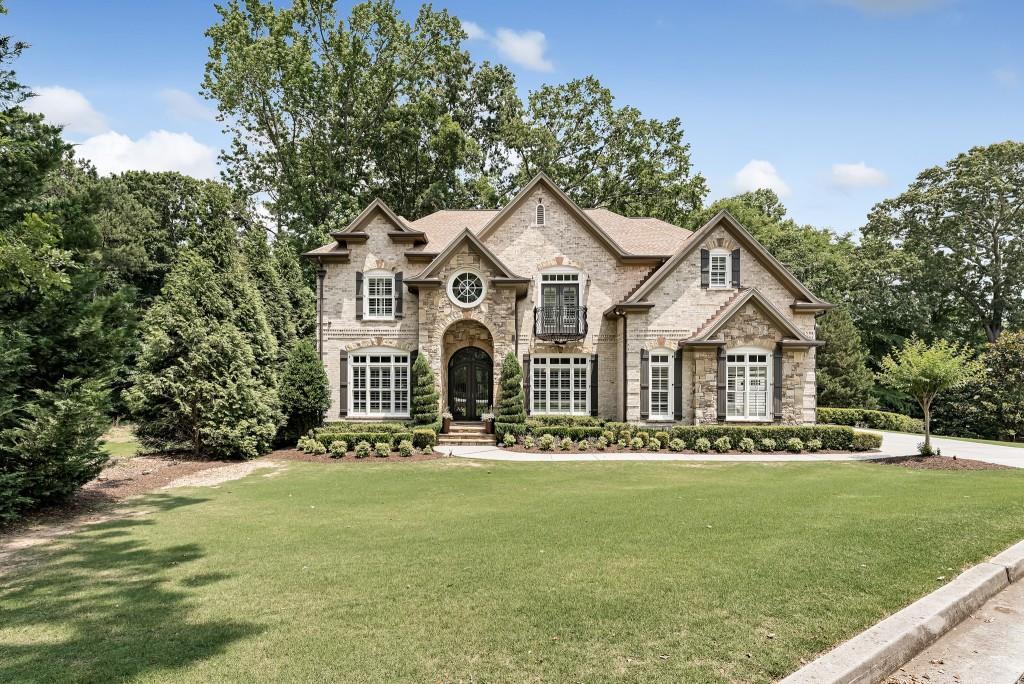 410 Blake Road Alpharetta, GA 30022 - Photo 1 of 1 Don't miss this stunning custom built 4 sided brick home.