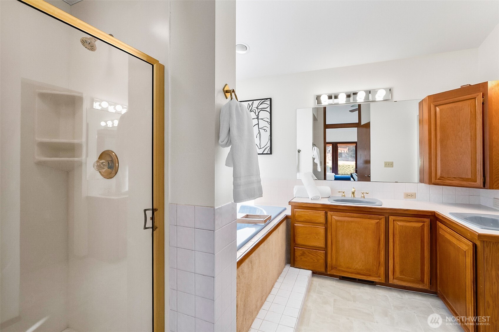 14630 High Bridge Road Monroe, WA 98272 - Photo 14 of 40 a bathroom with a tub sink and mirror