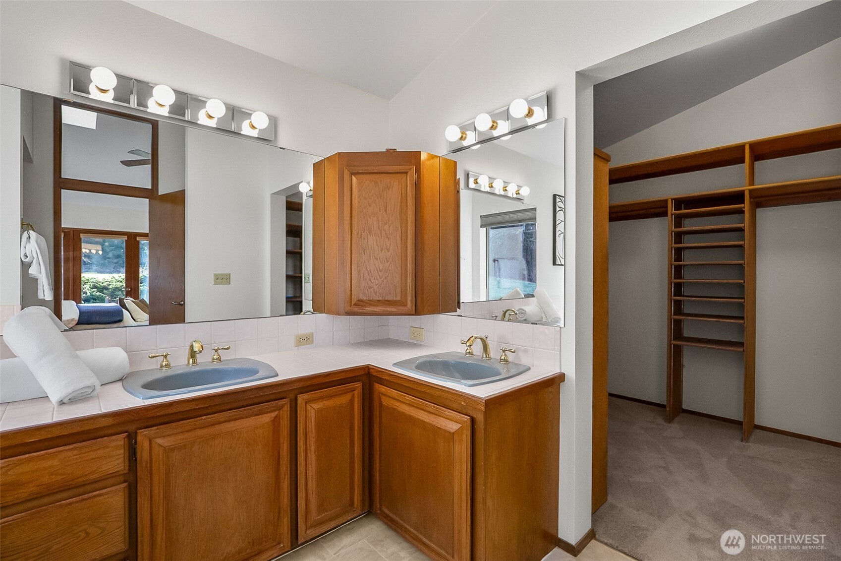 14630 High Bridge Road Monroe, WA 98272 - Photo 15 of 40 a bathroom with a sink and a mirror