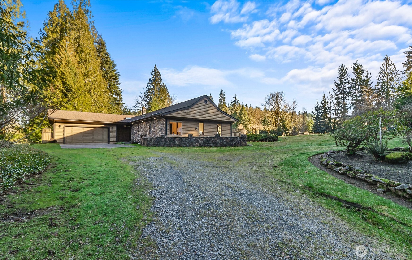 14630 High Bridge Road Monroe, WA 98272 - Photo 20 of 40 a front view of a house with garden
