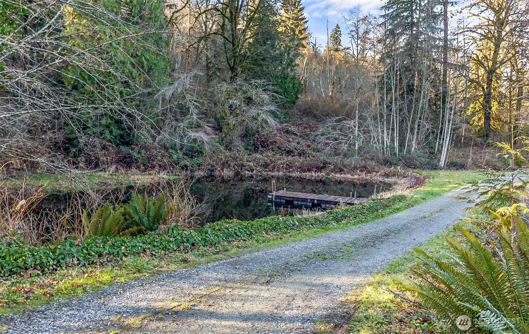 14630 High Bridge Road Monroe, WA 98272 - Photo 23 of 40 a backyard of a house with a yard and outdoor seating