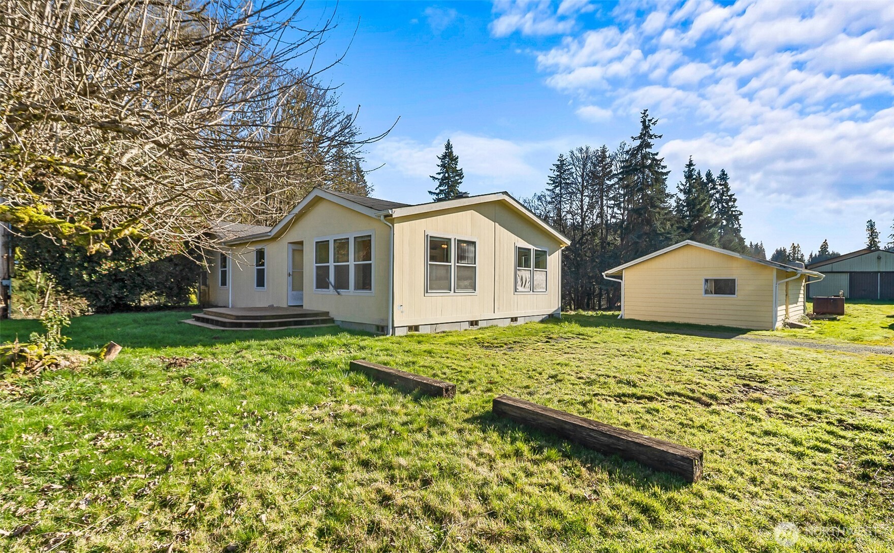 14630 High Bridge Road Monroe, WA 98272 - Photo 25 of 40 a house view with a garden space