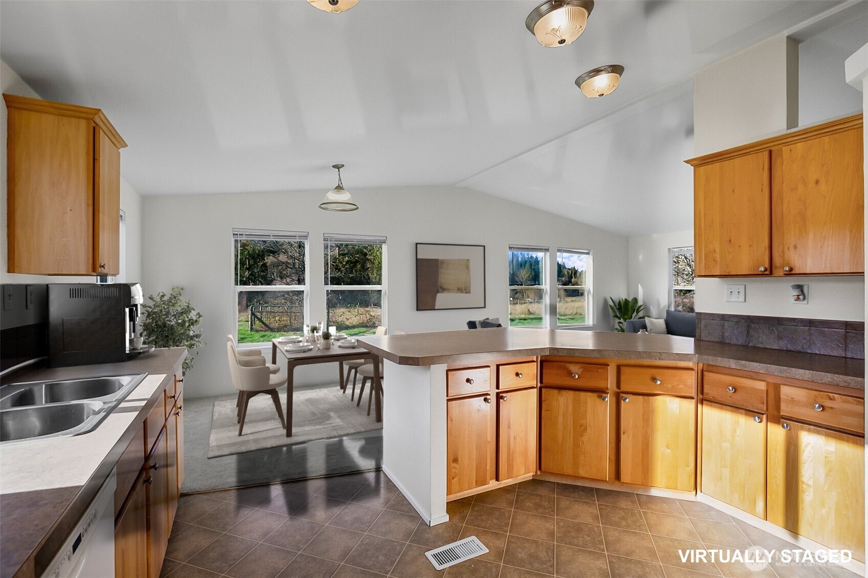 14630 High Bridge Road Monroe, WA 98272 - Photo 32 of 40 a kitchen with stainless steel appliances granite countertop a sink and a stove