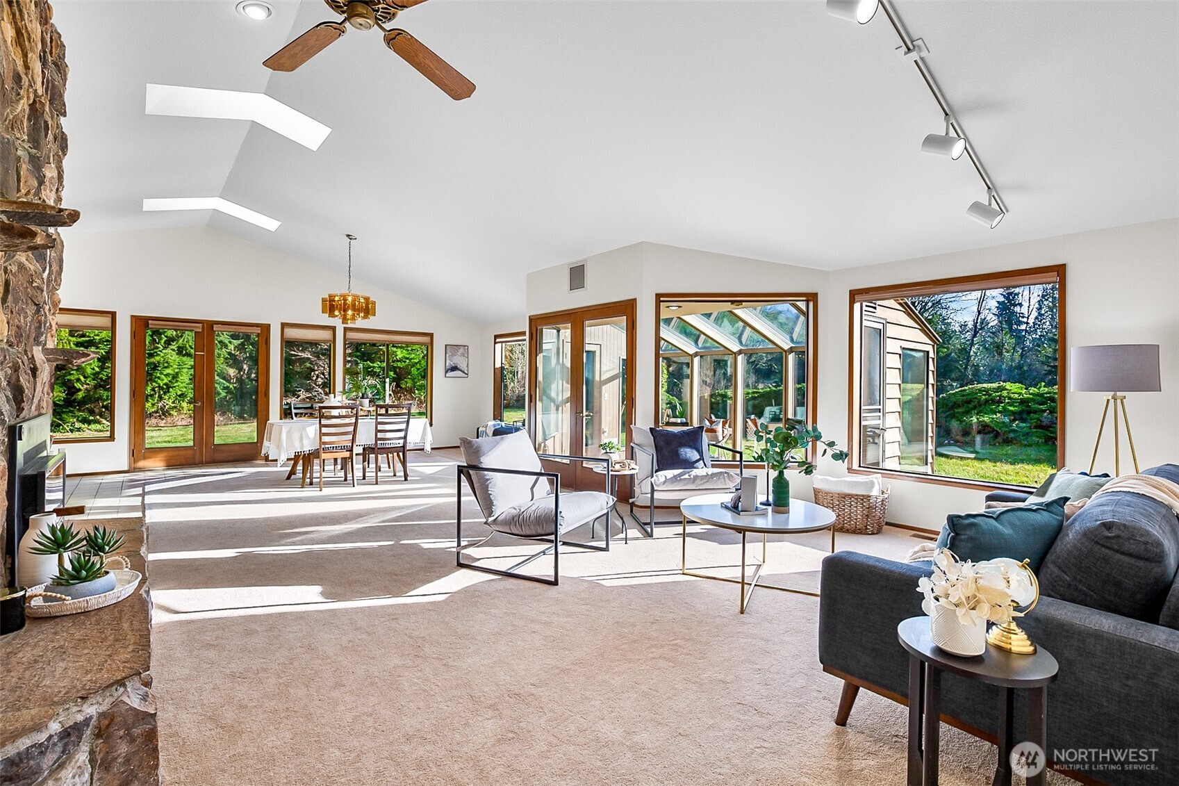 14630 High Bridge Road Monroe, WA 98272 - Photo 5 of 40 a living room with furniture and floor to ceiling windows