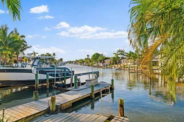 a view of a lake with outdoor seating