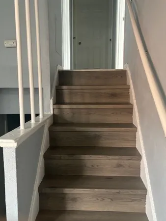 a room with a table and chairs