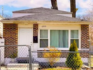 a kitchen with a sink cabinets and appliances