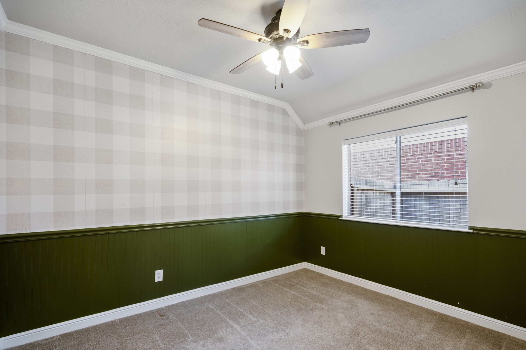 5802 Sawyer Bend Lane Spring, TX 77379 - Photo 26 of 50 an empty room with a window and a ceiling fan